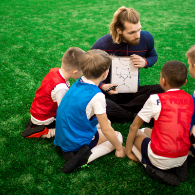 The teaching styles of a youth football coach